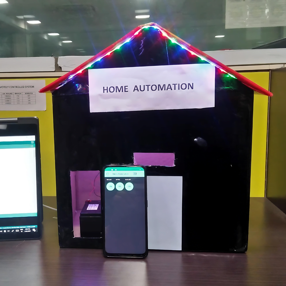 Home automation system enables control of household appliances like lights and fans via IoT through a mobile app.