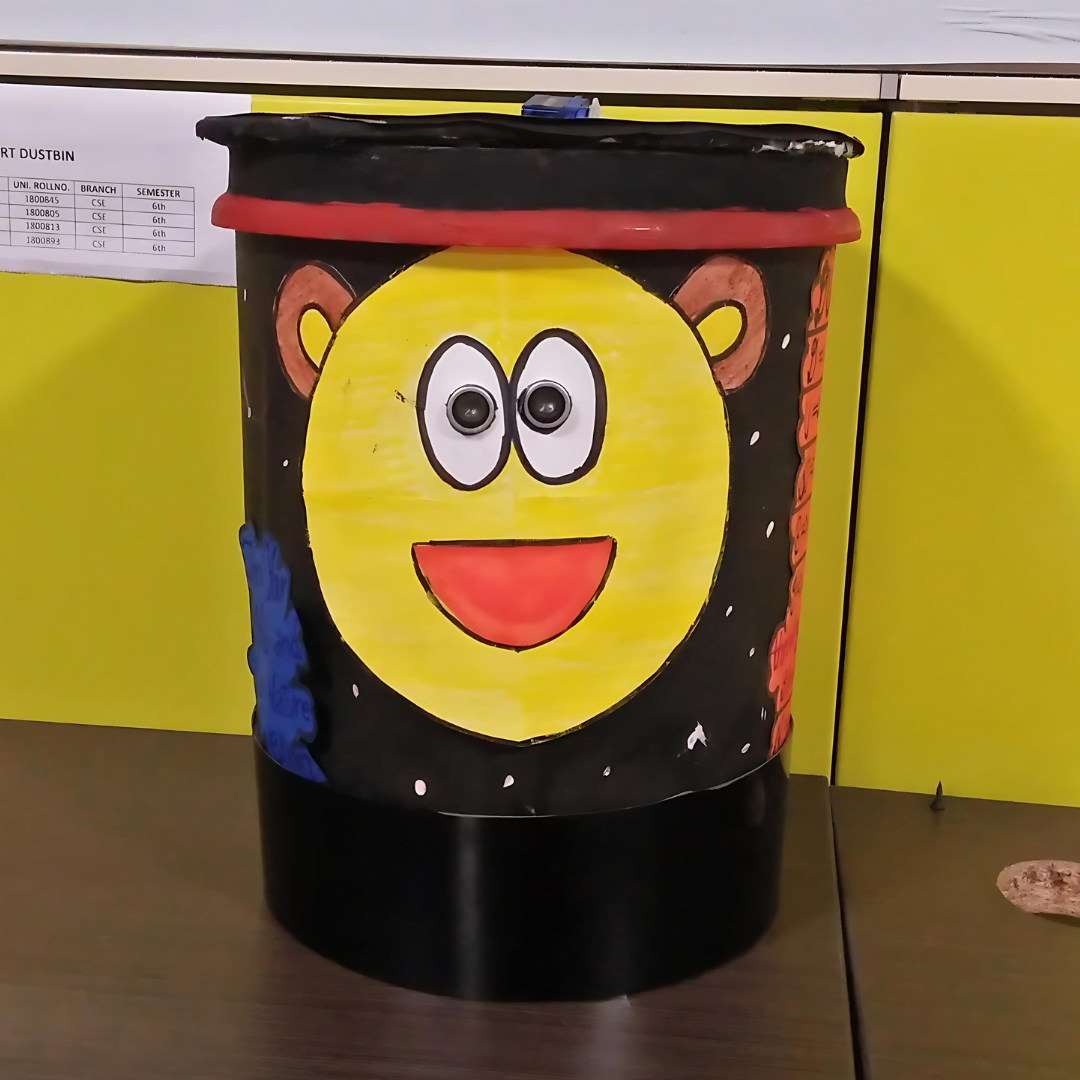 Smart dustbin with Arduino and ultrasonic sensor detects person approaching, automatically opening lid for garbage disposal.